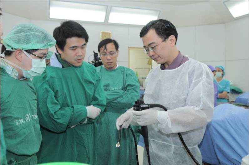 Doctor with trainees at the WGO Bangkok Training Center.